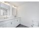 Elegant bathroom with double sink, white cabinets and stone countertops at 5862 Harbour Town Dr, Noblesville, IN 46062