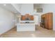 Spacious kitchen featuring stainless steel appliances, white countertops, and wood cabinets at 5874 Harbour Town Dr, Noblesville, IN 46062