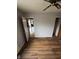 A bedroom with hardwood floors, closet and doors at 6533 Parker Ln, Indianapolis, IN 46220