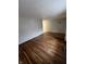 Spacious living room featuring hardwood floors and a neutral color palette, ready for personalization at 6533 Parker Ln, Indianapolis, IN 46220