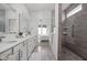 Bathroom featuring double vanity with an adjoining shower and bedroom at 7188 Covington St, Lebanon, IN 46052