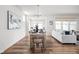 Elegant dining area with a wooden table, stylish chairs, and contemporary decor that is perfect for hosting at 7188 Covington St, Lebanon, IN 46052