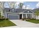 Inviting single-Gathering home with attached garage and a well-kept lawn at 7188 Covington St, Lebanon, IN 46052