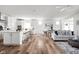 Open-concept living space with a modern kitchen, dining area, and a comfortable seating area at 7188 Covington St, Lebanon, IN 46052