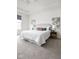 Light-filled main bedroom features a tray ceiling and carpet plus decorative lamps at 7188 Covington St, Lebanon, IN 46052