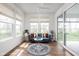 Cozy sunroom featuring comfortable seating, natural light, and serene views of the outdoors at 7188 Covington St, Lebanon, IN 46052