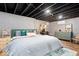 Basement bedroom features stylish decor and ample space for relaxation and comfort at 7643 Dean Rd, Indianapolis, IN 46240