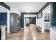 Hallway with access to the living room, laundry room, and kitchen at 7643 Dean Rd, Indianapolis, IN 46240