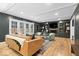 Bright and airy living room with doors to the backyard and a cozy seating area at 7643 Dean Rd, Indianapolis, IN 46240