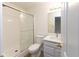 Bright bathroom with a glass-enclosed shower, white vanity, and modern fixtures at 8091 Crumwell Dr, Avon, IN 46123