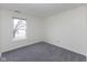 A bedroom with neutral paint and carpet with window letting in natural light at 8091 Crumwell Dr, Avon, IN 46123