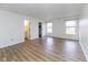 A spacious bedroom with wood-look floors, natural light and neutral color palette at 8091 Crumwell Dr, Avon, IN 46123