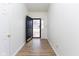 Inviting entryway with light wood flooring, a view of the front yard, and neutral-colored walls at 8091 Crumwell Dr, Avon, IN 46123