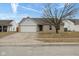 Charming single-story home featuring a two-car garage and a well-manicured front yard on a sunny day at 8091 Crumwell Dr, Avon, IN 46123