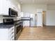 Stylish kitchen boasting stainless steel appliances, granite counters, and ample cabinet space at 8091 Crumwell Dr, Avon, IN 46123