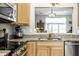 Bright kitchen with stainless steel appliances, granite counters, and an open design at 10246 Eller Creek Dr, Fishers, IN 46038