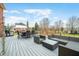 Entertain guests on the spacious outdoor deck with a dining area, lounge seating, and grill at 1032 Westview Point Dr, Columbus, IN 47201