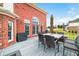 Back deck boasts a dining set, grill, and lounge, making it ideal for Gathering time and BBQs at 1032 Westview Point Dr, Columbus, IN 47201