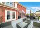 Enjoy outdoor living on the deck with comfortable seating and dining areas, accessible from the home's interior at 1032 Westview Point Dr, Columbus, IN 47201