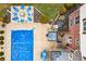 Aerial view of the backyard with a hot tub, lounge furniture, and a covered swimming pool at 1032 Westview Point Dr, Columbus, IN 47201