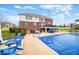 Enjoy this backyard featuring a covered pool, hot tub, and an abundance of seating at 1032 Westview Point Dr, Columbus, IN 47201