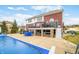 Backyard showcasing the pool, hot tub, and an abundance of space for entertaining at 1032 Westview Point Dr, Columbus, IN 47201