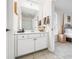 Bathroom featuring vanity with white cabinets and countertop, and a mirror at 1032 Westview Point Dr, Columbus, IN 47201