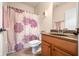 Bathroom featuring vanity with wood cabinets and countertop, toilet, and shower/tub combination at 1032 Westview Point Dr, Columbus, IN 47201