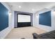 A home theater features a screen, carpet flooring, and recessed lights at 1032 Westview Point Dr, Columbus, IN 47201
