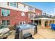 In-ground hot tub with privacy landscaping and a walk-out basement at 1032 Westview Point Dr, Columbus, IN 47201