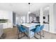 Bright eat-in kitchen featuring a center island with seating for six and an open-concept design with modern decor at 1032 Westview Point Dr, Columbus, IN 47201