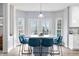 Kitchen nook features modern table and chairs, bright light, and opens to the outdoor space at 1032 Westview Point Dr, Columbus, IN 47201