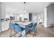 Spacious eat-in kitchen featuring two islands, seating, and hardwood floors, creating an ideal gathering space at 1032 Westview Point Dr, Columbus, IN 47201