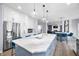 Large kitchen with a marble island, stainless steel appliances, and open concept design to the living room at 1032 Westview Point Dr, Columbus, IN 47201