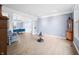 Spacious living room with hardwood floors, large windows, and elegant furnishings at 1032 Westview Point Dr, Columbus, IN 47201
