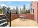 Private brick patio featuring a bistro set perfect for outdoor relaxation at 1032 Westview Point Dr, Columbus, IN 47201