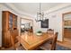 Dining room with vintage hutch and decorative table at 1086 Pebble Brook Dr, Noblesville, IN 46062