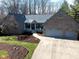 Charming brick home with a well-manicured lawn and a spacious two-car garage at 1086 Pebble Brook Dr, Noblesville, IN 46062