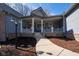 Inviting front porch featuring decorative columns and flower boxes at 1086 Pebble Brook Dr, Noblesville, IN 46062