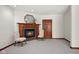 Cozy living room featuring a wood-burning fireplace and elegant decor, perfect for relaxing at 1086 Pebble Brook Dr, Noblesville, IN 46062