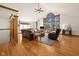 Bright living room features soaring ceilings, a large arched window and hardwood floors at 1086 Pebble Brook Dr, Noblesville, IN 46062