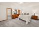 Spacious main bedroom features a light carpet and ensuite bathroom access at 1086 Pebble Brook Dr, Noblesville, IN 46062