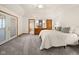 Spacious main bedroom features a light carpet and ensuite bathroom access at 1086 Pebble Brook Dr, Noblesville, IN 46062
