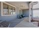 Cozy porch with comfortable seating and natural light at 1086 Pebble Brook Dr, Noblesville, IN 46062