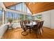 Sunroom with multiple windows and vaulted ceilings at 1086 Pebble Brook Dr, Noblesville, IN 46062