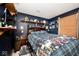 Bedroom with a bed, shelving, and decor at 12064 N Glena Pl, Mooresville, IN 46158