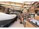 Organized garage space featuring boat storage, work benches, and ample tool storage at 12064 N Glena Pl, Mooresville, IN 46158