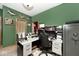 Functional home office featuring a desk, comfortable chair, shelving, and plenty of room for productivity at 12064 N Glena Pl, Mooresville, IN 46158