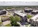 An aerial view of buildings, landscaping and parking in a suburban area at 15 W Executive Dr # 104, Carmel, IN 46032