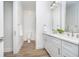 Modern bathroom featuring double vanity with modern lighting and fixtures at 15 W Executive Dr # 104, Carmel, IN 46032